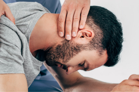Man having physiotherapy neck assessment for his vertigo and dizziness struggles 